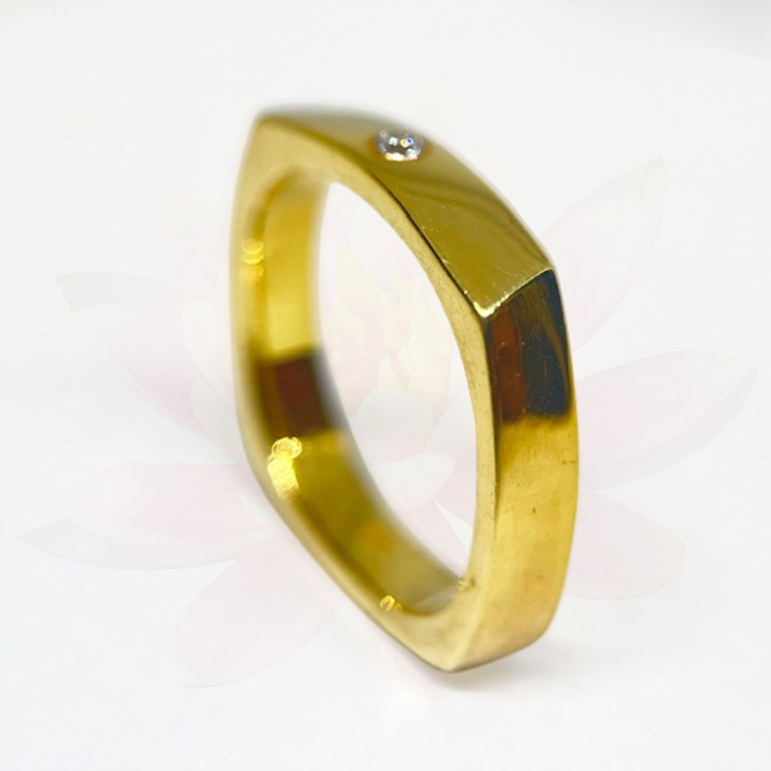 Cattlin Modern Flat Band Wedding Ring with Central Diamond Accent Stone