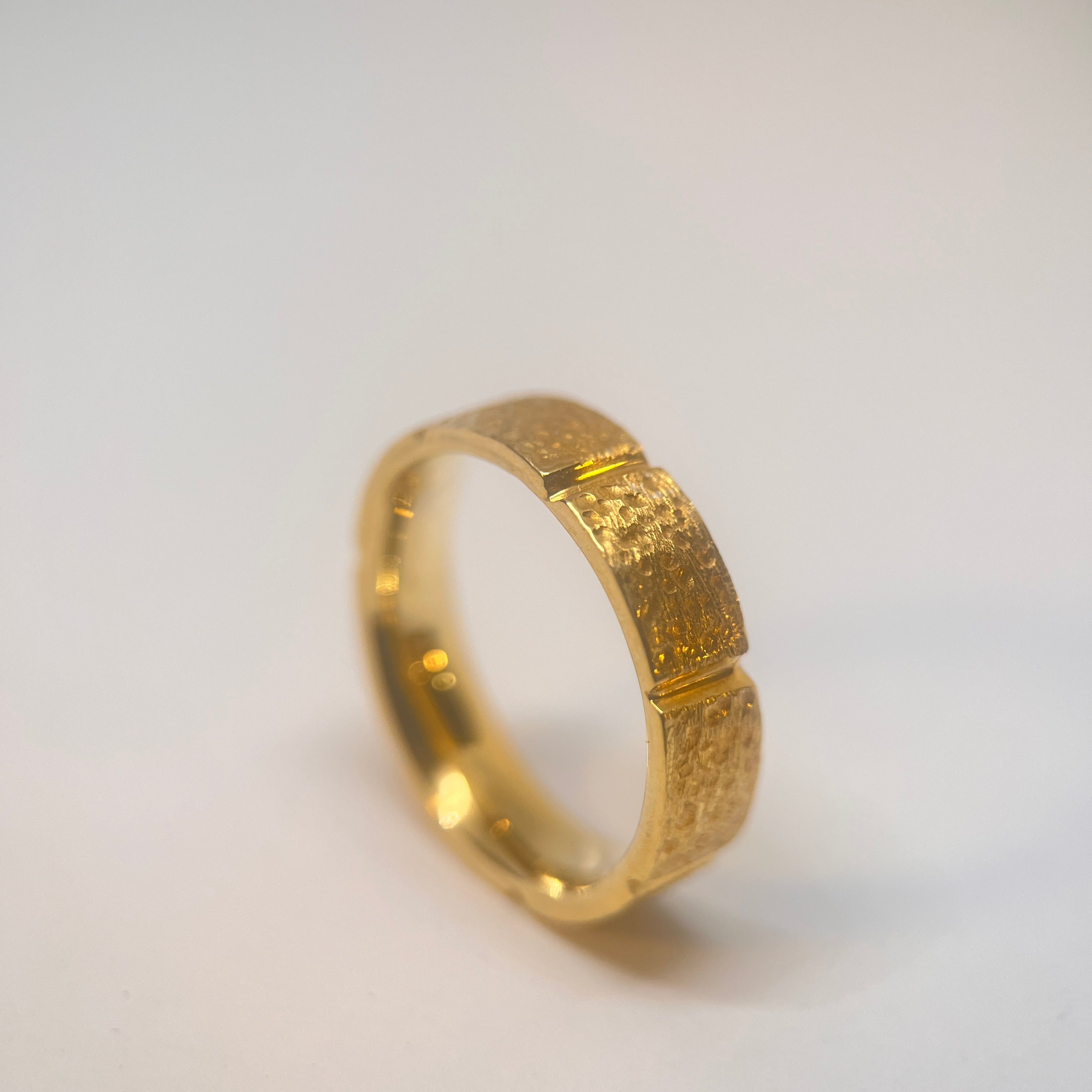 Avani Hammered Finish Gold Wedding Band 5.0mm