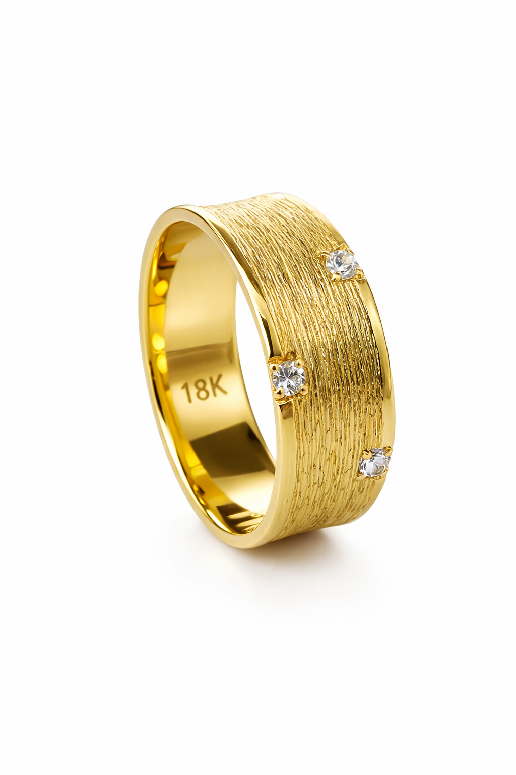 Gold ring with diamond accents on a white background