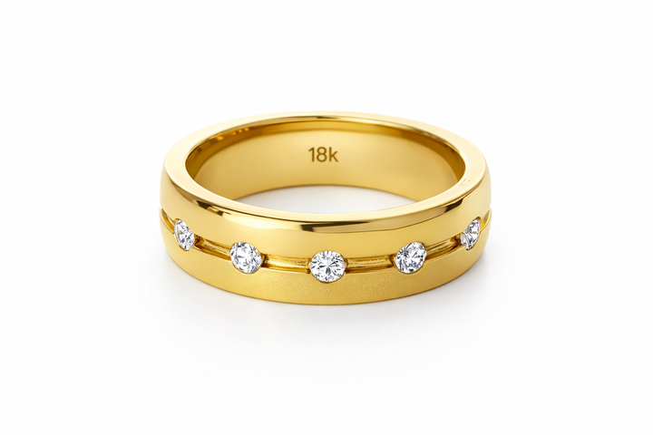 Handcrafted 14K/18K gold wedding band features polished, rounded edges, in the center, a sulked line houses a series of sparkling diamonds.