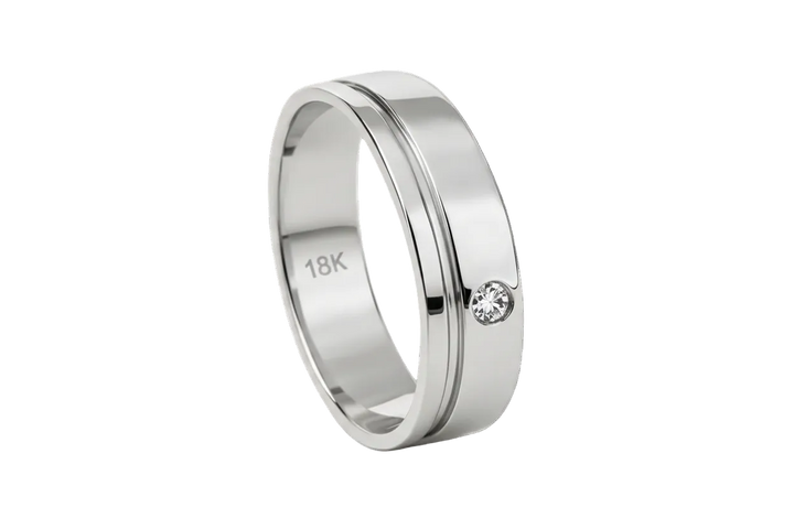 Gold ring with a diamond on a white gold