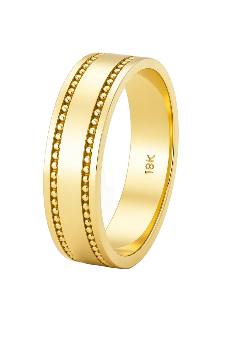Gold ring with '18K' marking on a white background
